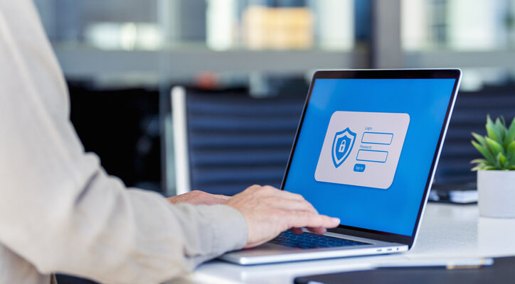 Businessman logging on to a password protected website