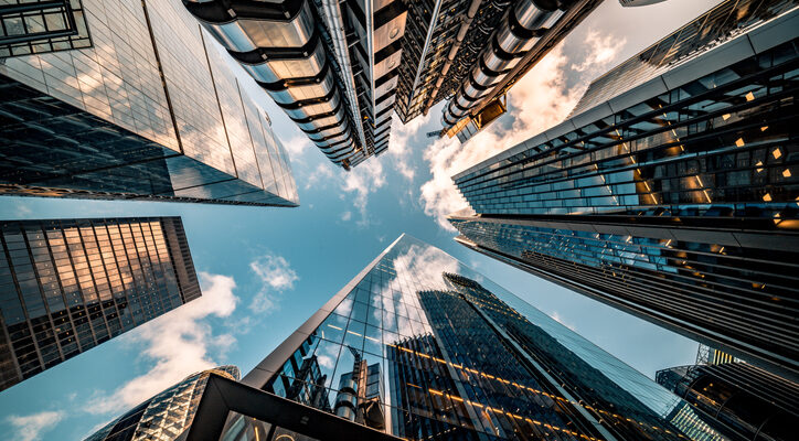 Looking directly up at the skyline of the financial district in central London
