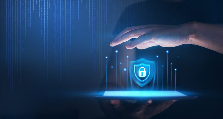 Hands protecting Personal Data information on Tablet